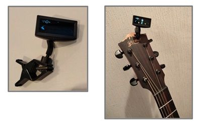 ギターのヘッドに取り付けられたクリップチューナー