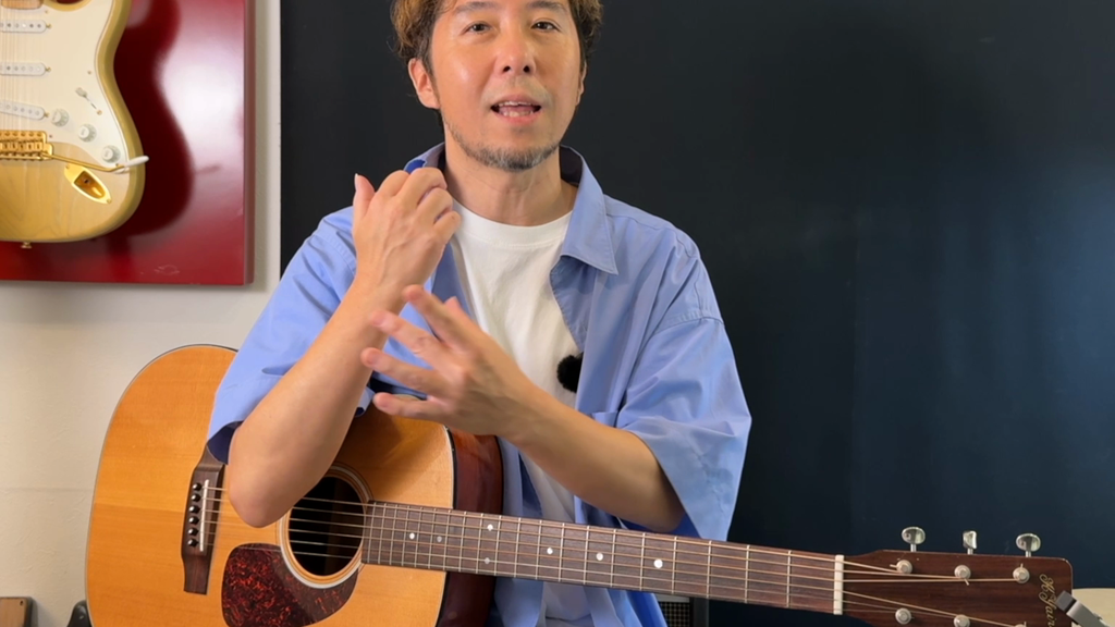 前腕を回す動きを手で示している高村尚平